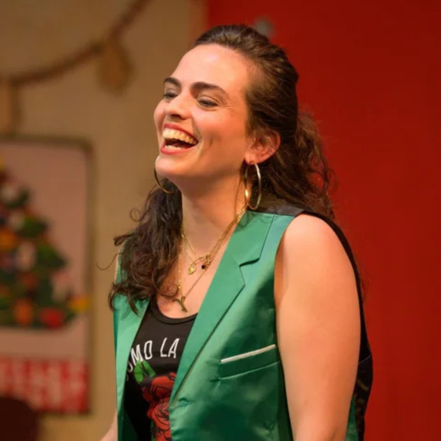 A Bodega Princess Remembers La Fiesta de Los Reyes Magos, 1998 — Iraisa Ann Reilly laughing in a green satin vest